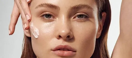 A woman with radiant skin after sun exposure, exploring tips to reverse tanned skin for a glowing complexion.