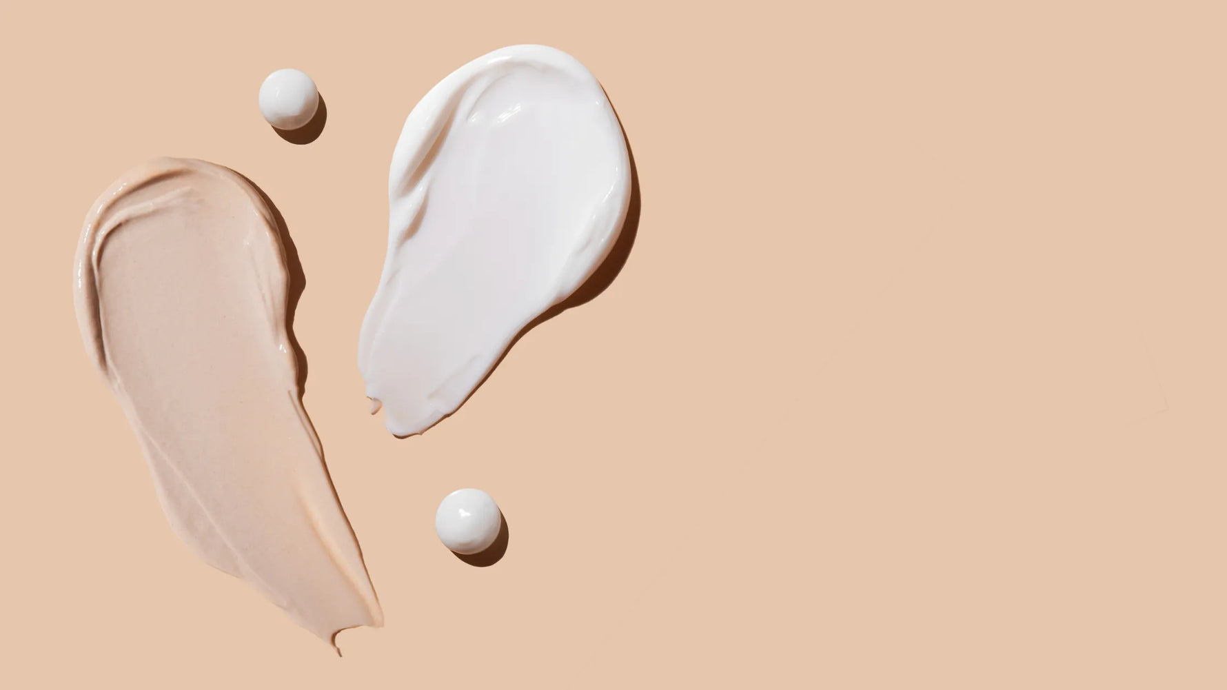 A woman applying a mattifying moisturizer to her oily face for effective skincare solutions.