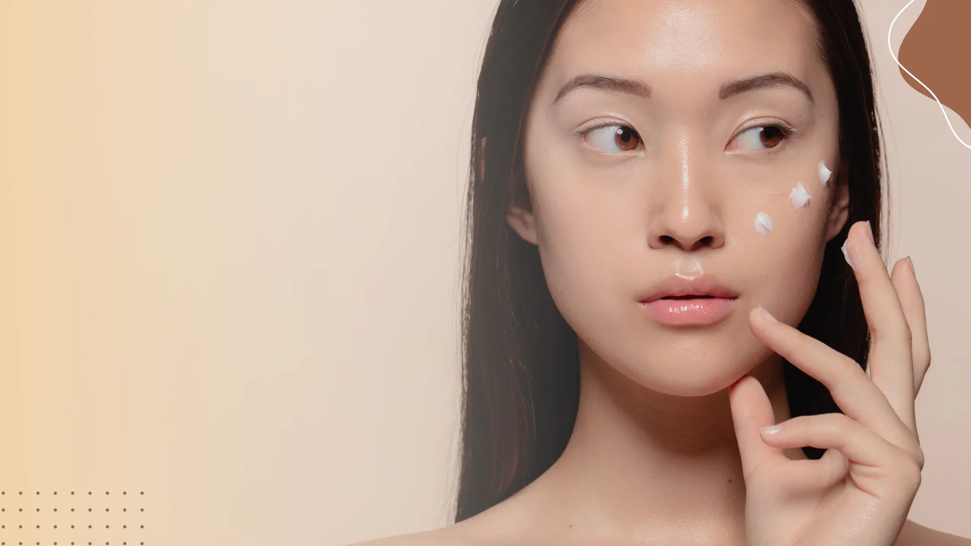 A woman applying moisturizer to her face, showcasing essential skincare tips for effective hydration.