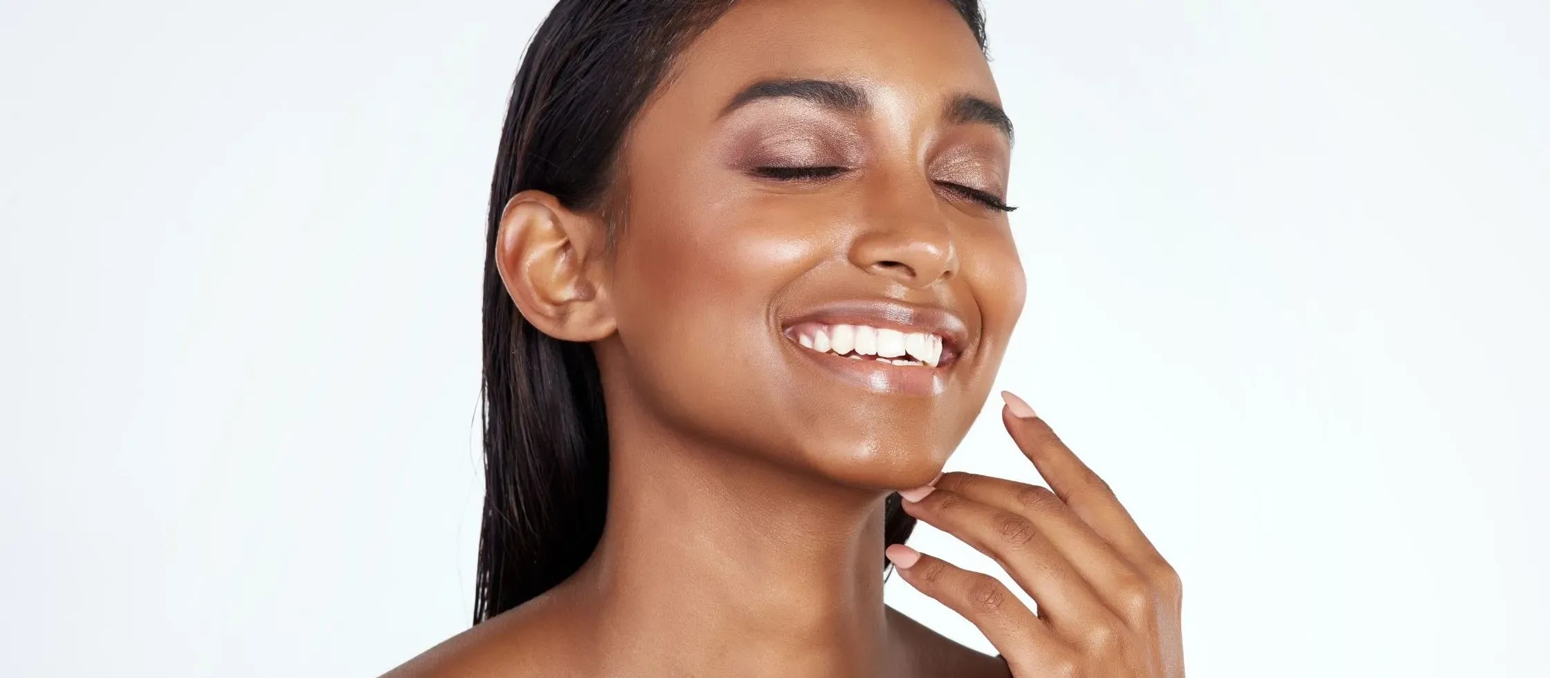 A person using a face wash and cleanser in a skincare routine for clear skin.