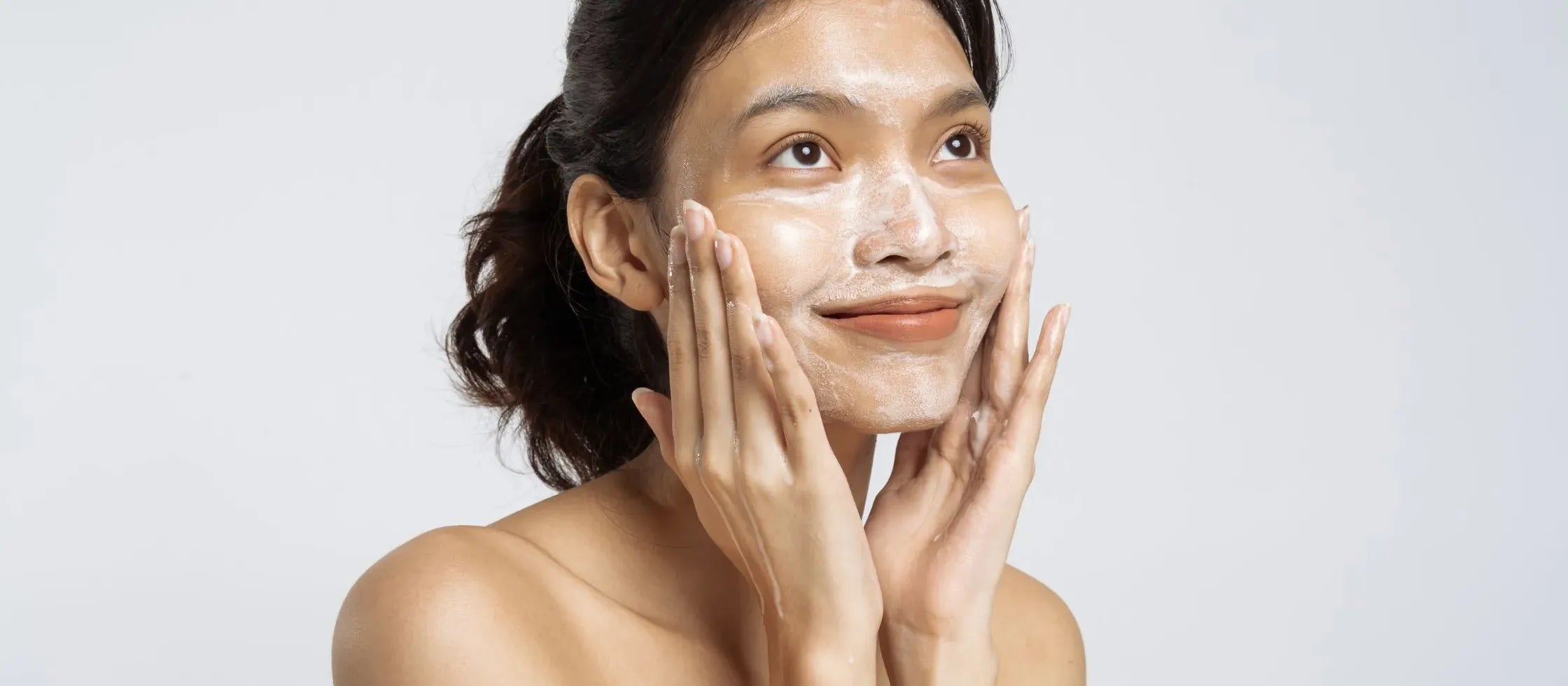 A refreshing open pores face wash bottle on a bathroom counter, promoting clear skin and healthy complexion.