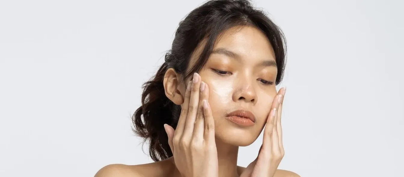 A bottle of effective acne face wash designed for dry skin solutions on a bathroom countertop.